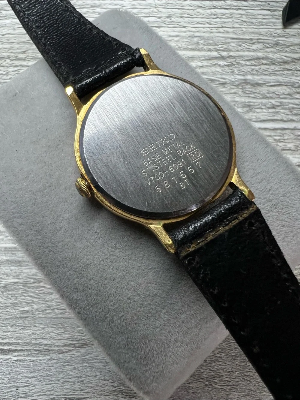 Seiko Gold-Tone Case White Roman numeral Dial Black Leather Strap Watch